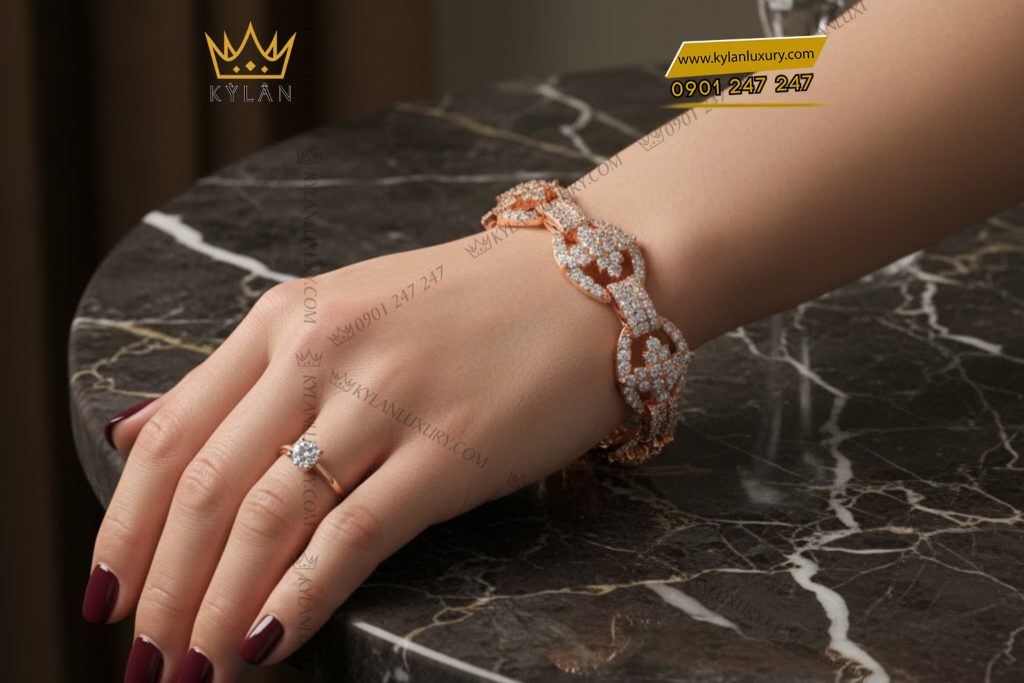 Lắc tay vàng hồng Au750 đính kim cương 