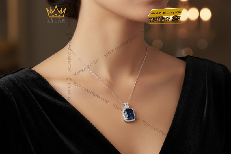 Mặt dây chuyền vàng trắng Au750 đính đá sapphire xanh