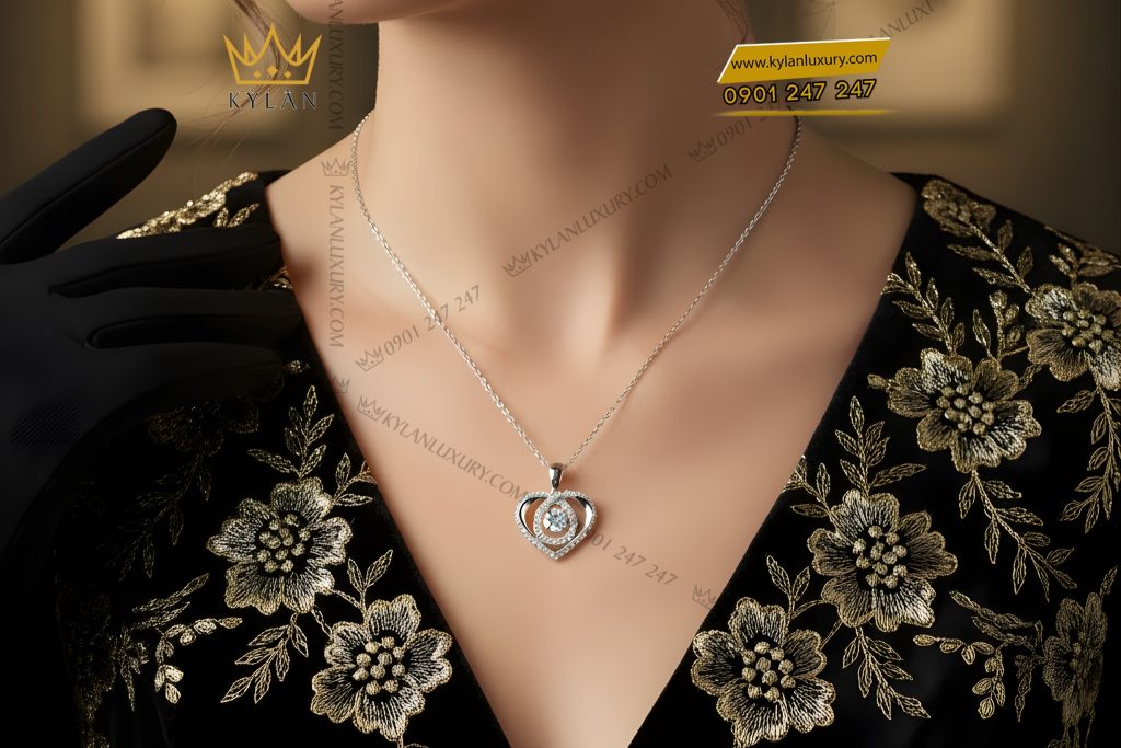 Mặt dây chuyền trái tim vàng trắng Au750 đính kim cương
