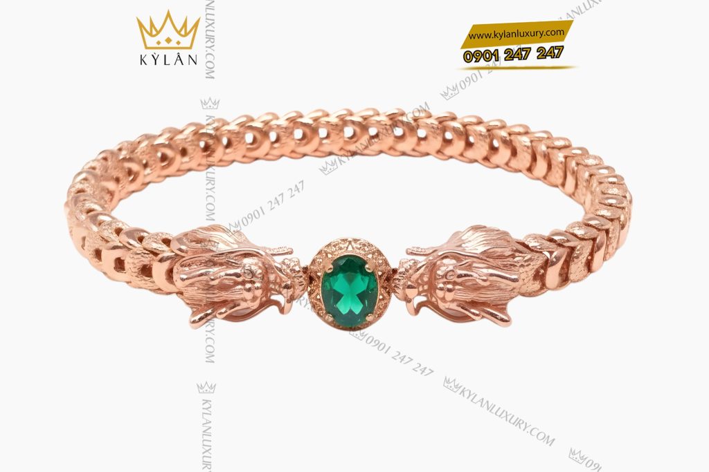 Lắc tay Rồng vàng hồng Au750 đính đá quý xanh