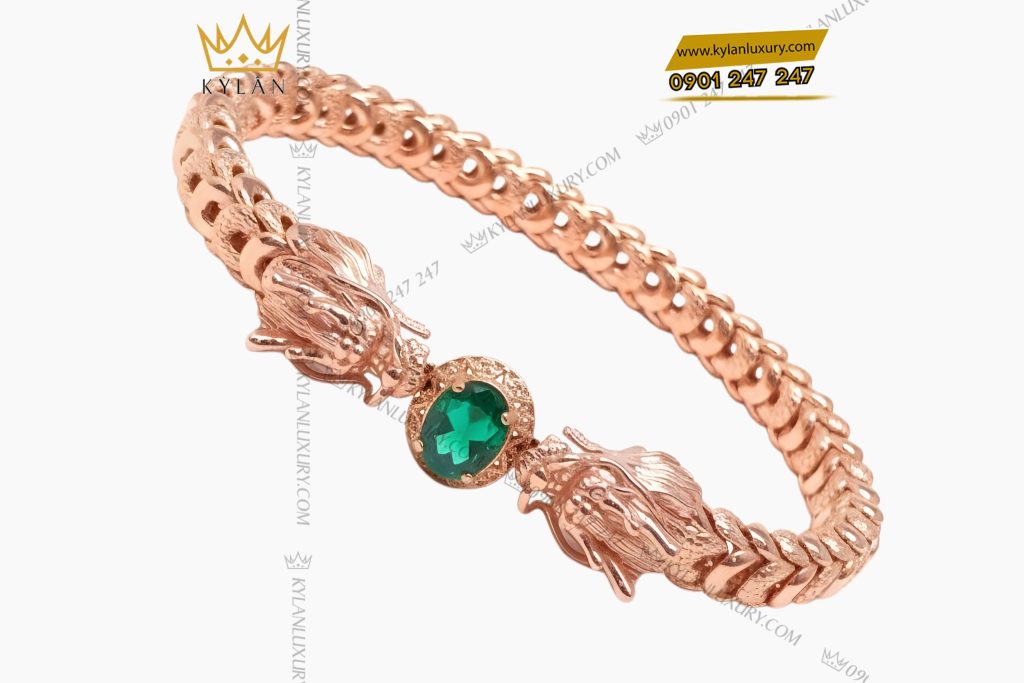 Lắc tay Rồng vàng hồng Au750 đính đá quý xanh