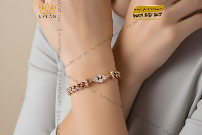 Lắc tay vàng hồng Au750 đính kim cương
