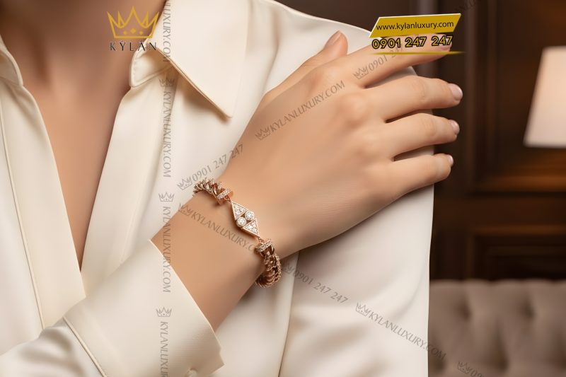 Lắc tay vàng hồng Au750 đính kim cương