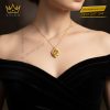 Mặt dây chuyền vàng Au750 đính kim cương và đá quý vàng