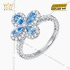 Nhẫn nữ vàng trắng Au750 hoa 4 cánh đính kim cương và topaz