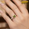 Nhẫn nữ vàng hồng Au750 đính kim cương và đá quý xanh