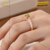 Nhẫn nữ vàng hồng Au750 đính kim cương và đá quý xanh