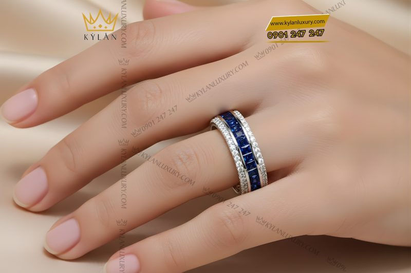 Nhẫn nữ vàng trắng Au750 đính kim cương và đá quý xanh