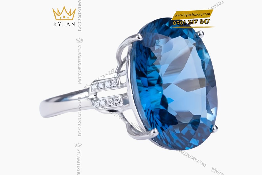 Nhẫn nữ vàng trắng Au750 đính viên chủ đá Topaz