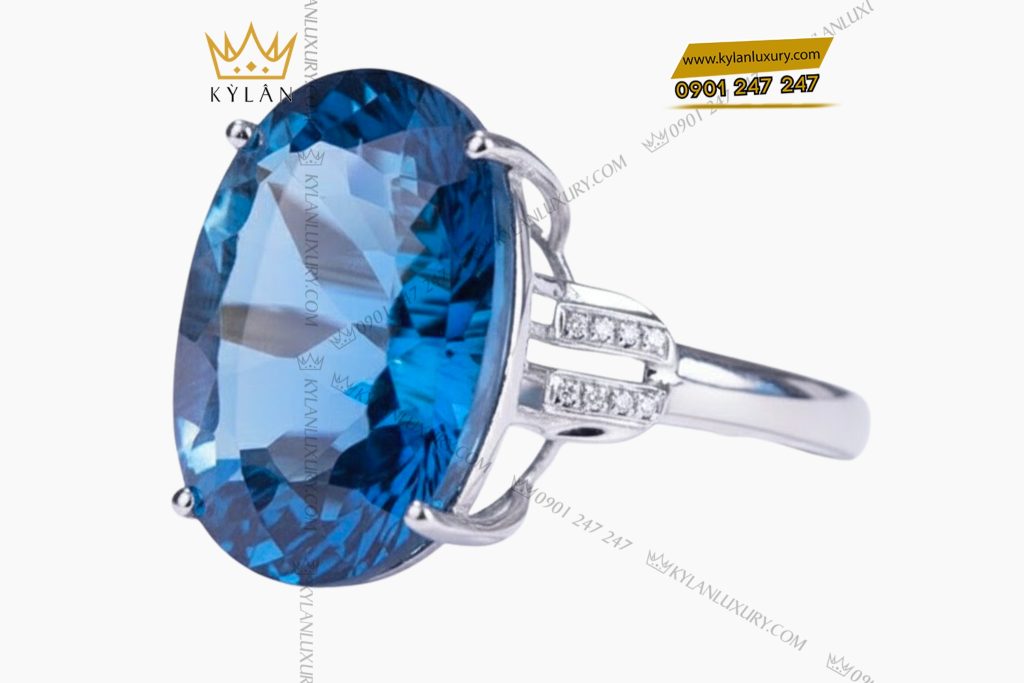 Nhẫn nữ vàng trắng Au750 đính viên chủ đá Topaz