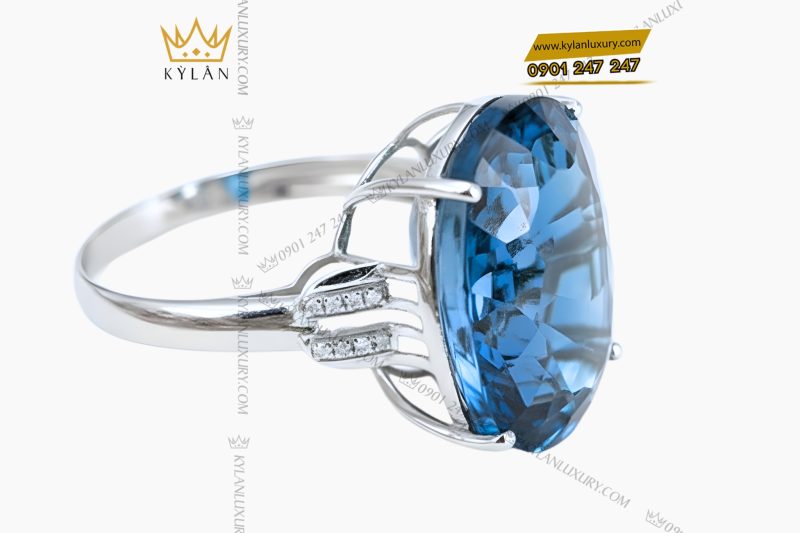 Nhẫn nữ vàng trắng Au750 đính viên chủ đá Topaz