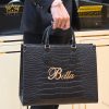 Túi xách nữ full da cá Alligator black đính logo chữ Bella vàng Au750