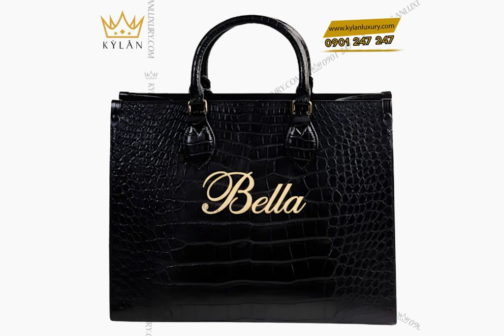 Túi xách nữ full da cá Alligator black đính logo chữ Bella vàng Au750