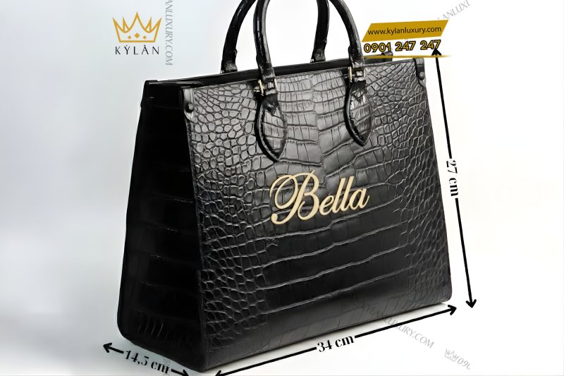 Túi xách nữ full da cá Alligator black đính logo chữ Bella vàng Au750