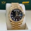 Đồng hồ Rolex Day Date 40 vàng vàng mặt số đen 228238-0004