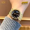 Đồng hồ Rolex Day-Date 40 vàng vàng mặt số đen 228238-0004