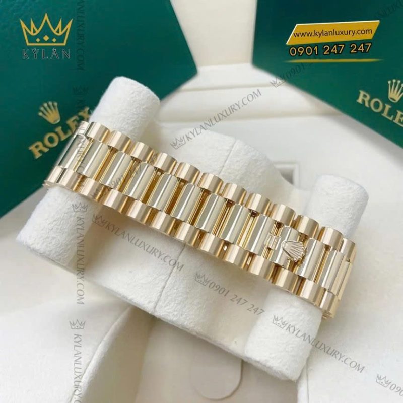 Đồng hồ Rolex Day-Date 40 vàng vàng mặt số đen 228238-0004