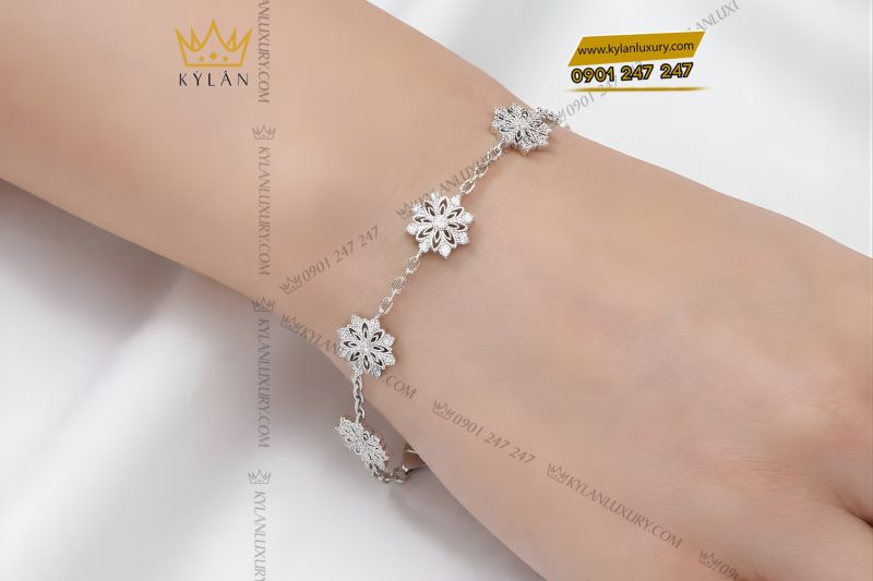 Lắc tay hoa tuyết vàng trắng Au750 đính kim cương