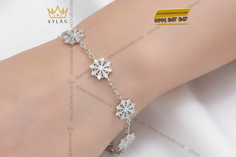 Lắc tay hoa tuyết vàng trắng Au750 đính kim cương
