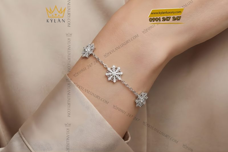 Lắc tay hoa tuyết vàng trắng Au750 đính kim cương