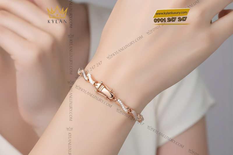 Lắc tay vàng hồng Au750 đính kim cương