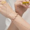 Lắc tay vàng hồng Au750 đính kim cương