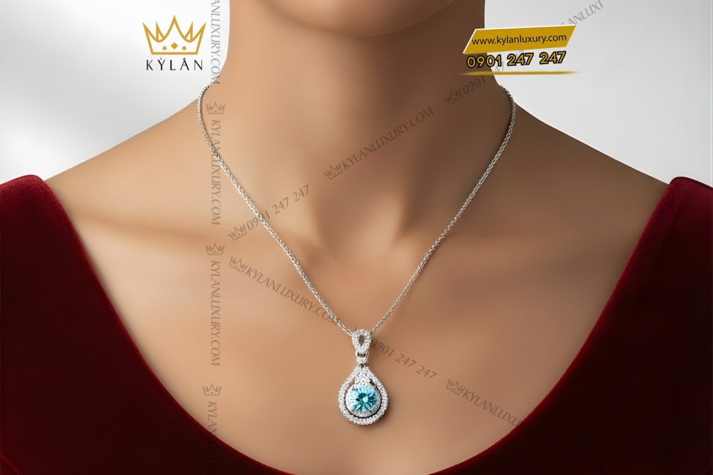 Mặt dây chuyền vàng trắng Au750 đính kim cương và đá Topaz