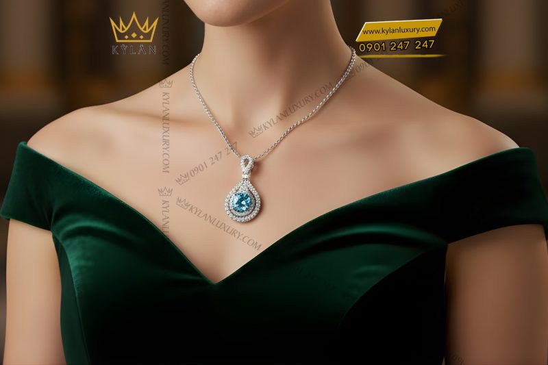 Mặt dây chuyền vàng trắng Au750 đính kim cương và đá Topaz