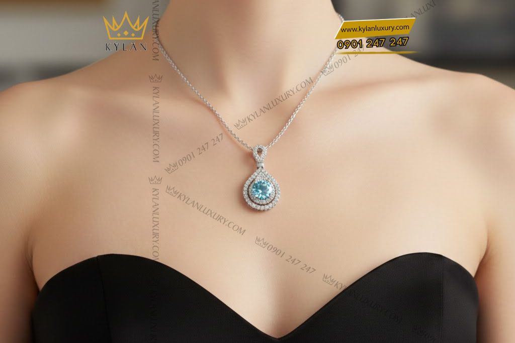 Mặt dây chuyền vàng trắng Au750 đính kim cương và đá Topaz