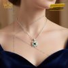 Mặt dây chuyền vàng trắng Au750 đính kim cương và đá quý xanh