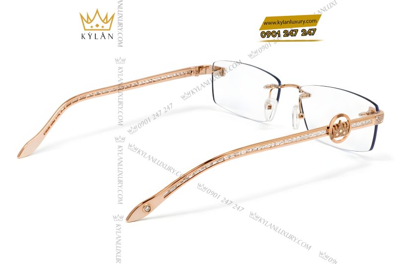 Mắt kính vàng hồng Au750 đính logo vương miện và kim cương baguette