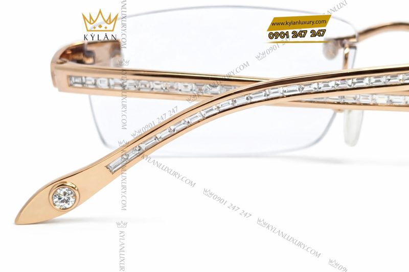 Mắt kính vàng hồng Au750 đính logo vương miện và kim cương baguette