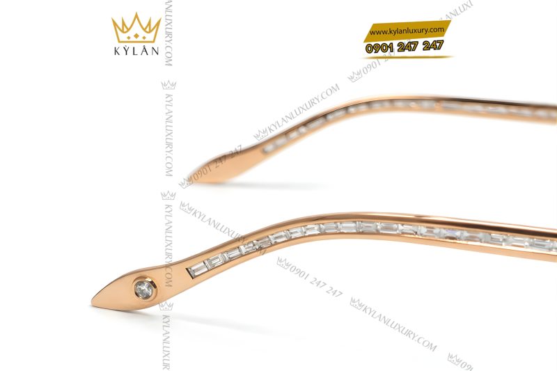 Mắt kính vàng hồng Au750 đính logo vương miện và kim cương baguette