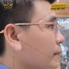 Mắt kính vàng hồng Au750 đính logo vương miện và kim cương baguette