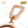 Móc khóa charm logo vương miện vàng hồng Au750 đính kim cương