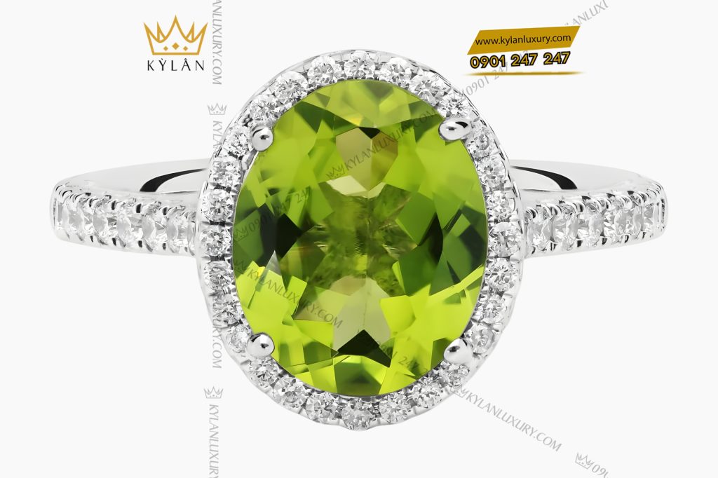 Nhẫn nữ vàng trắng Au750 đính kim cương và đá quý xanh 3 Nhẫn nữ vàng trắng Au750 đính kim cương và đá quý xanh