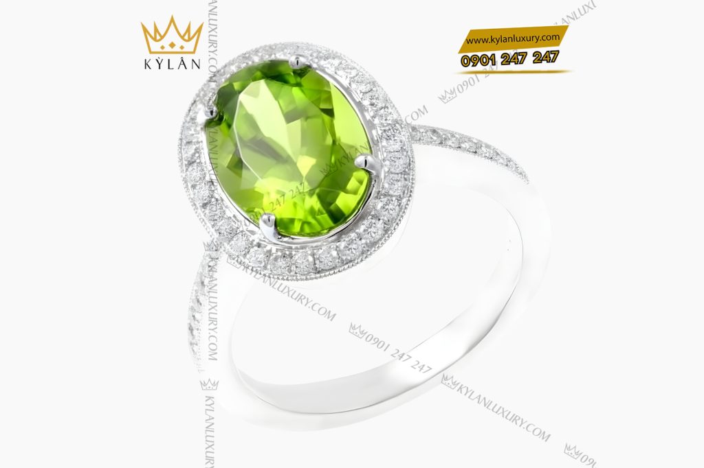 Nhẫn nữ vàng trắng Au750 đính kim cương và đá quý xanh 8 Kỳ Lân Luxury Nhan nu vang trang Au750 dinh kim cuong va da quy xanh 3 Nhẫn nữ vàng trắng Au750 đính kim cương và đá quý xanh