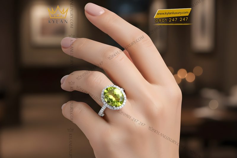 Nhẫn nữ vàng trắng Au750 đính kim cương và đá quý xanh