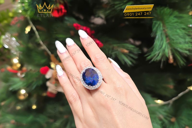 Nhẫn nữ vàng trắng Au750 đính kim cương và đá sapphire xanh