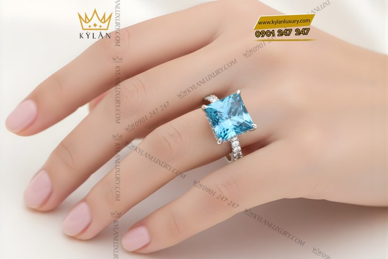 Nhẫn nữ vàng trắng Au750 đính kim cương và đá topaz