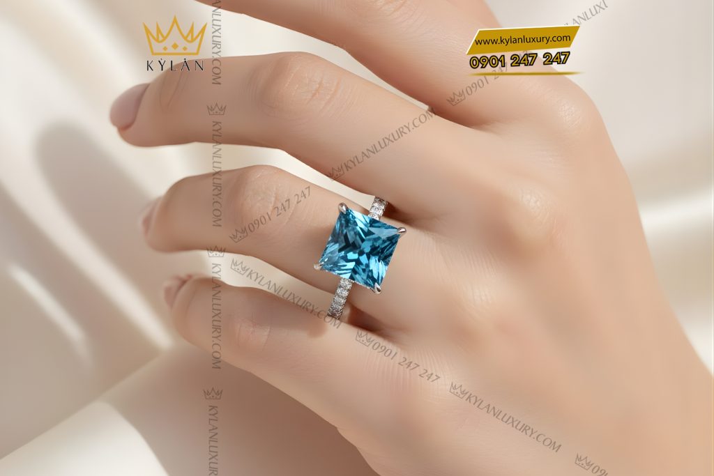 Nhẫn nữ vàng trắng Au750 đính kim cương và đá topaz 6 Nhẫn nữ vàng trắng Au750 đính kim cương và đá topaz