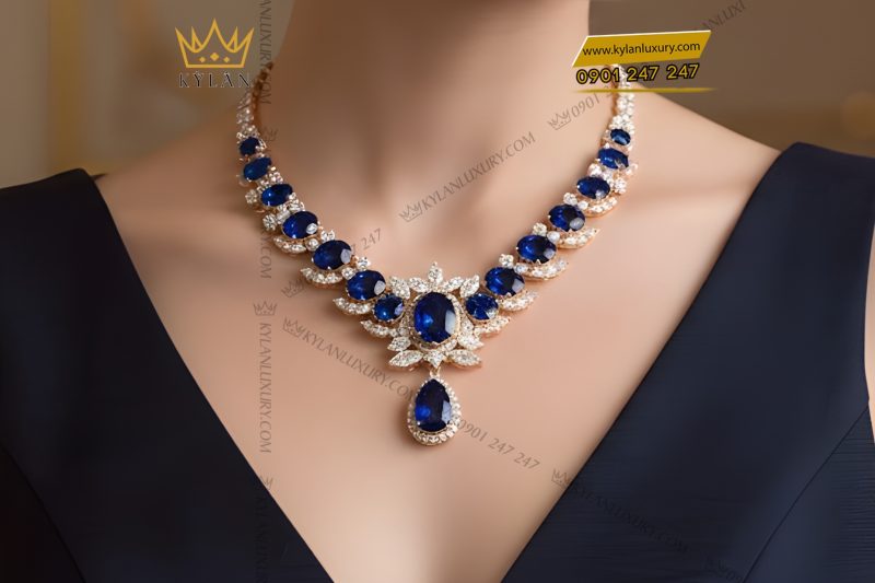 Dây chuyền vàng hồng Au750 đính kim cương và đá quý xanh