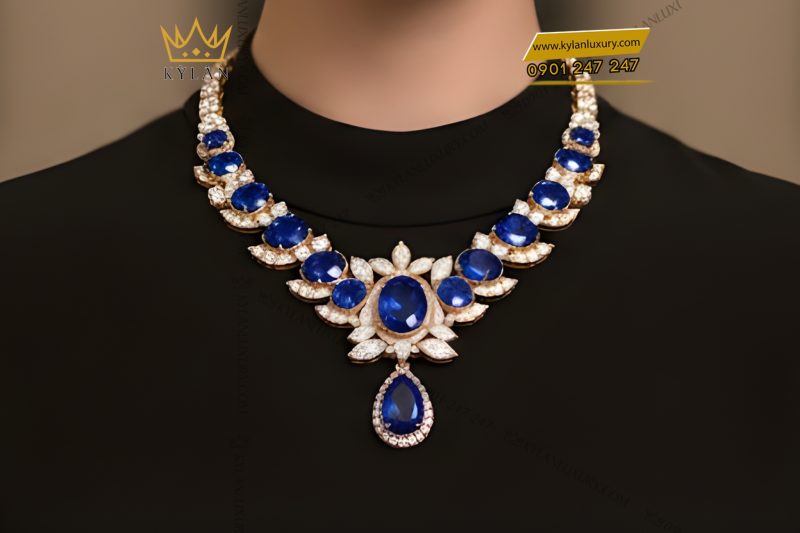 Dây chuyền vàng hồng Au750 đính kim cương và đá quý xanh