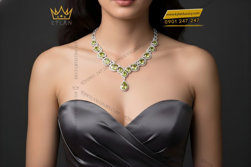 Dây chuyền vàng trắng Au750 đính kim cương và đá quý xanh