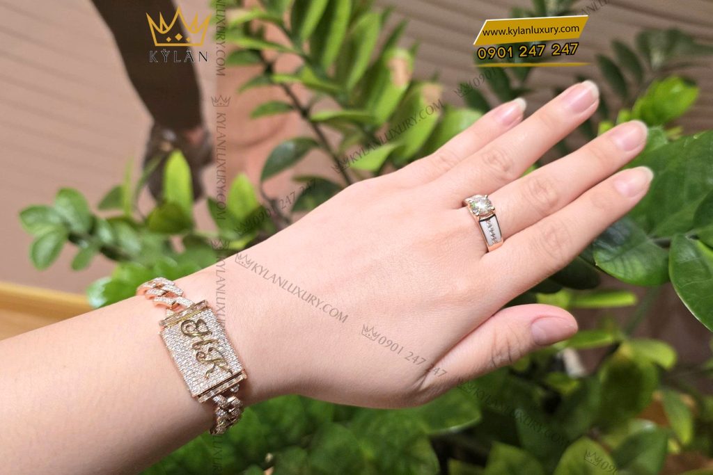 Lắc tay HK vàng hồng Au750 đính kim cương