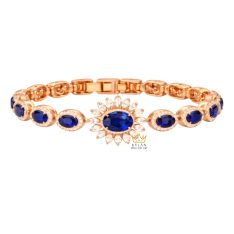 Lắc tay vàng hồng Au750 đính kim cương và đá quý xanh