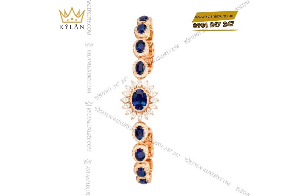 Lắc tay vàng hồng Au750 đính kim cương và đá quý xanh