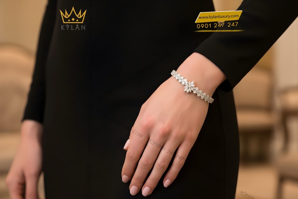 Lắc tay vàng trắng Au750 đính kim cương