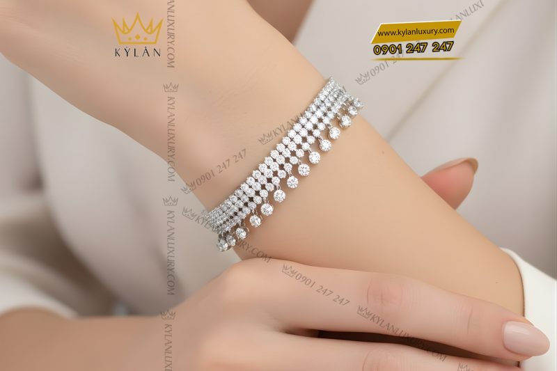 Lắc tay vàng trắng Au750 đính kim cương