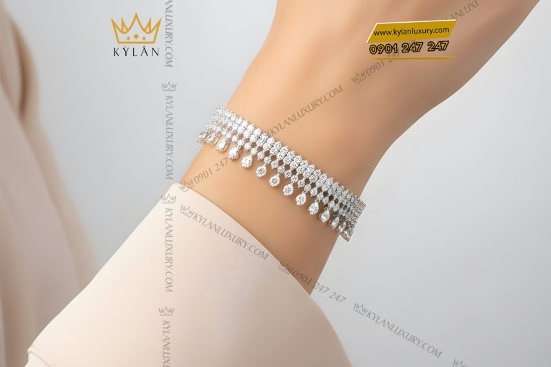 Lắc tay vàng trắng Au750 đính kim cương